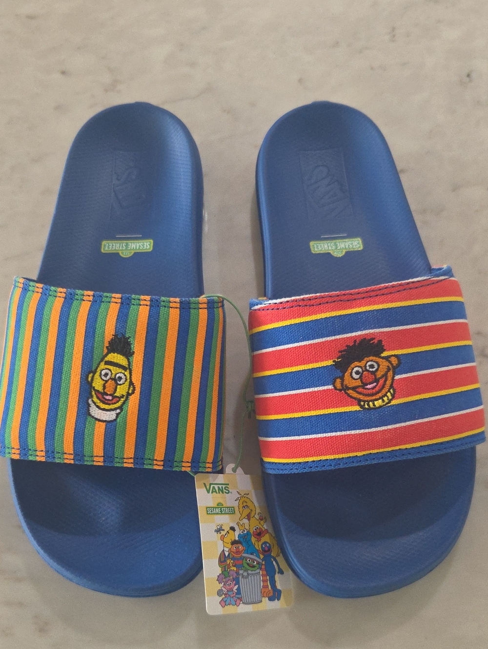 Vans Kids Blue Slide Sandals with Colorful Striped Sesame Street Straps